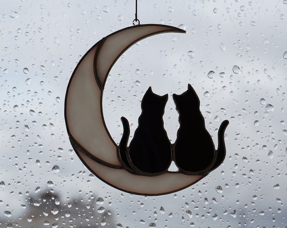 Two Black Cats On The Moon
